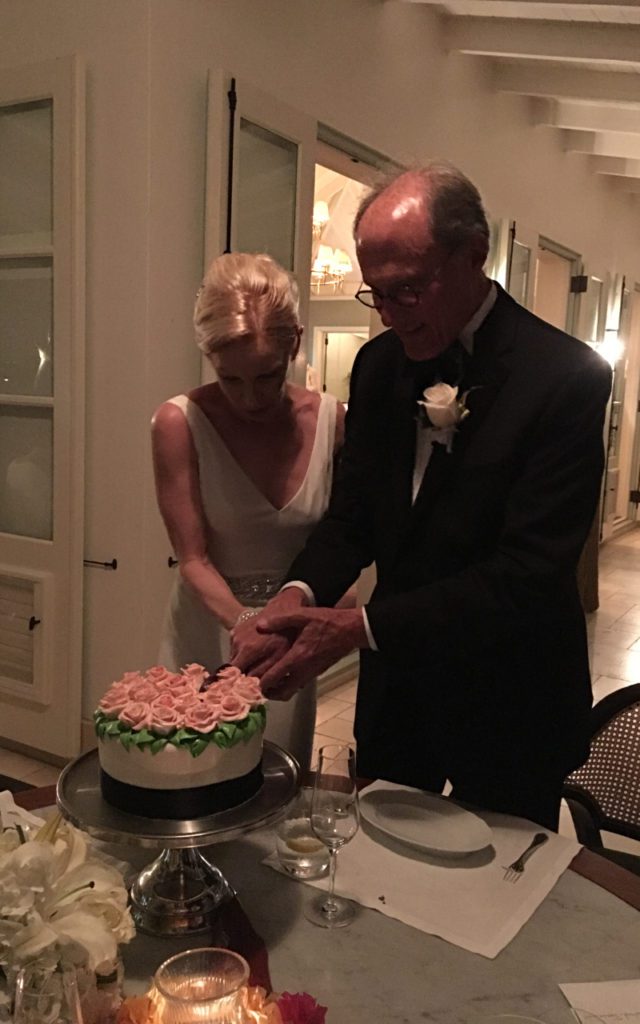 The Bride cuts the cake.