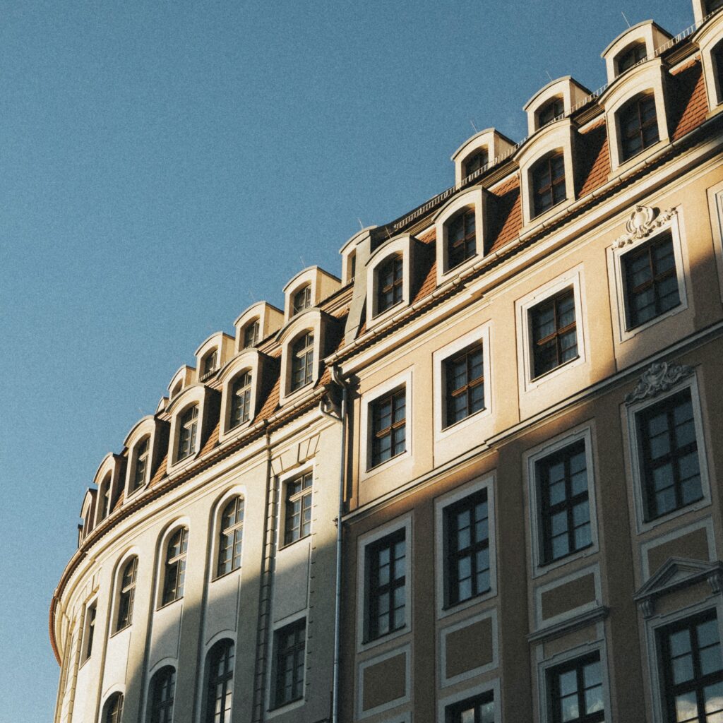 Classic European apartment building under the blue sky