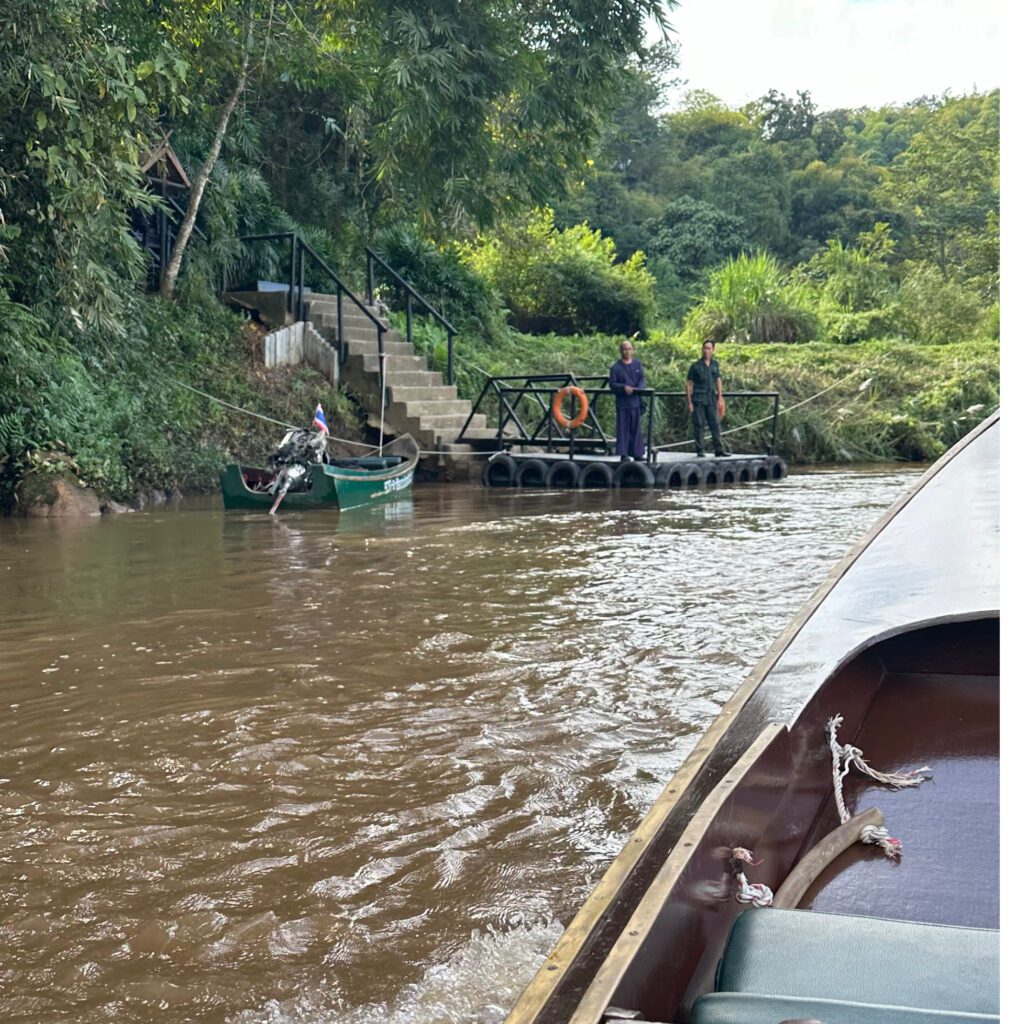 Our Long Tail Boat approaches the Elephant Camp Dock on the Ruak River