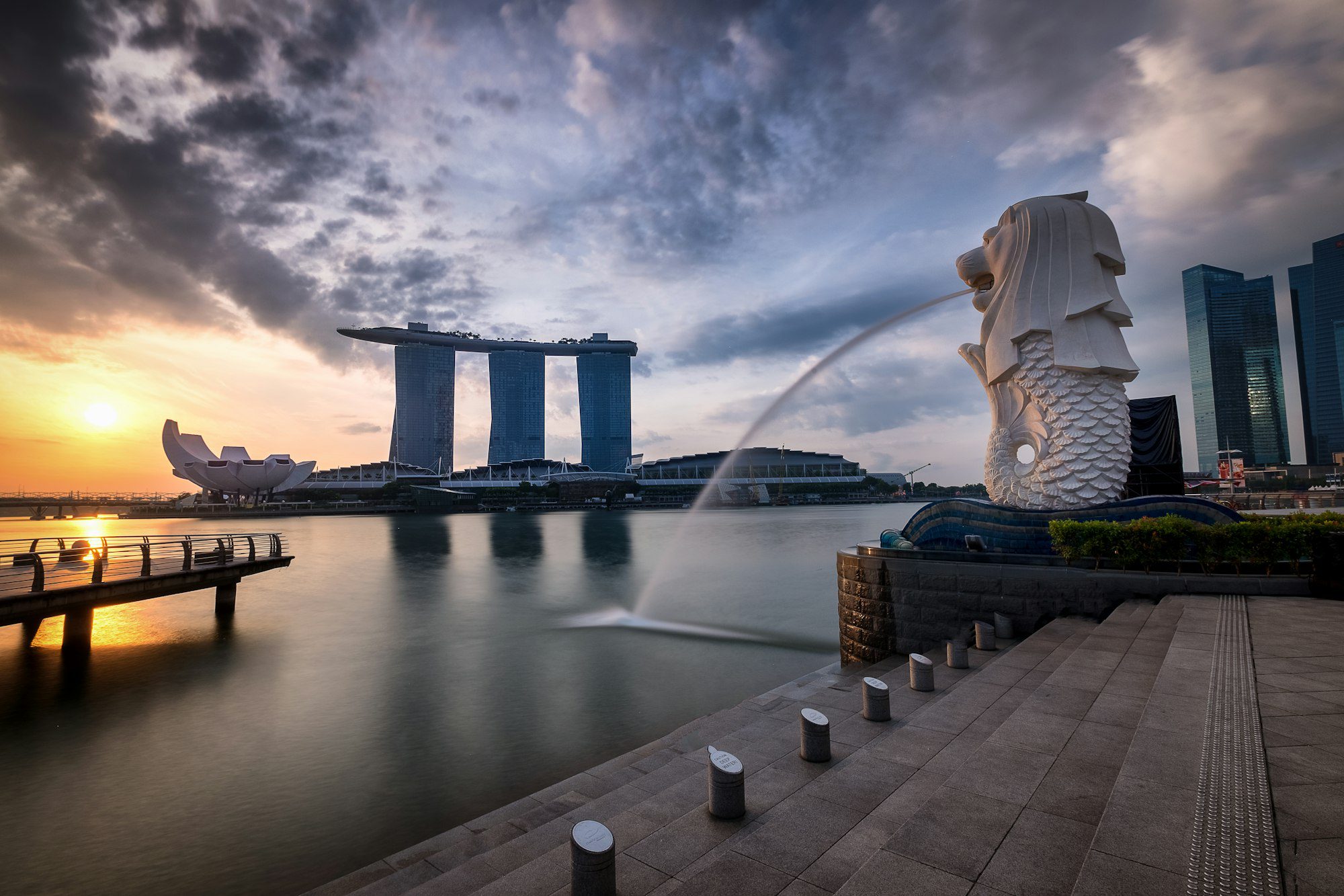 Merlion looks over the Bay at sunrise